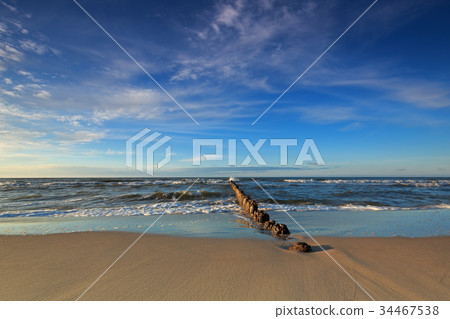 Baltic Sea and the breakwater at dusk Baltic Sea and the breakwater at dusk 34467538