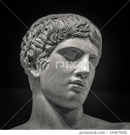 Head and shoulders detail of the ancient sculpture 34467698