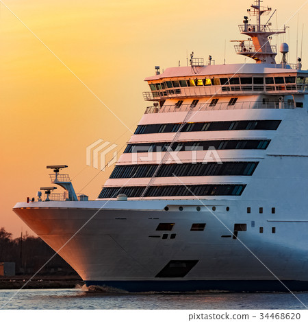 White cruise liner at sunset White cruise liner at sunset 34468620