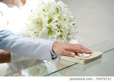 Two hands praying for wedding 34470722