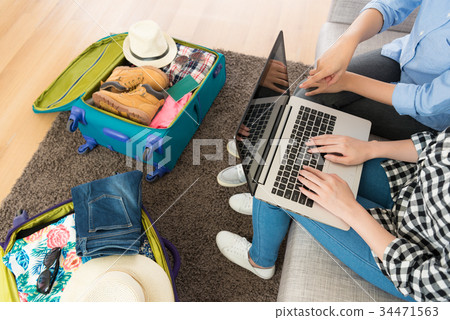 high angle view photo of two people using computer high angle view photo of two people using computer 34471563