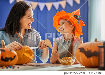 family preparing for Halloween. family preparing for Halloween. 34473485