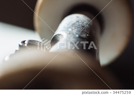 Skateboard truck with wheels and kingpin close up Skateboard truck with wheels and kingpin close up 34475259