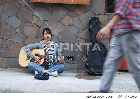 Street musician woman Street musician woman 34477160