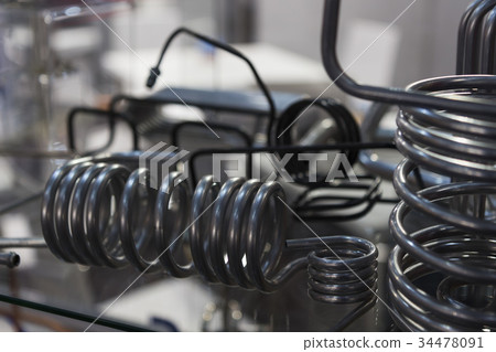 Close up tube or coil of heat exchanger Close up tube or coil of heat exchanger 34478091