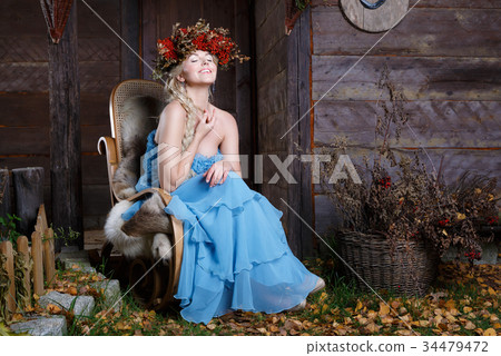 Beautiful blonde in a blue dress Beautiful blonde in a blue dress 34479472