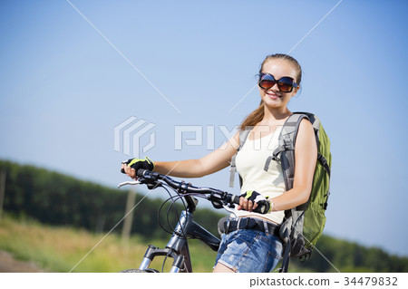 Summer bike walk 34479832