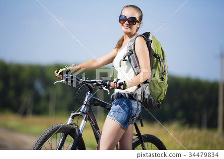 Summer bike walk 34479834