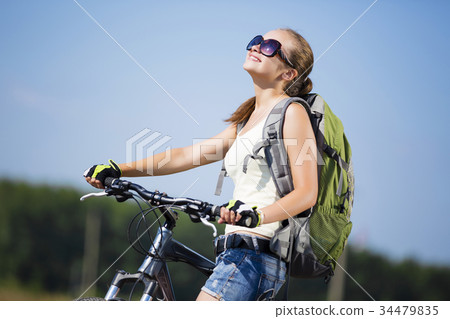 Summer bike walk 34479835