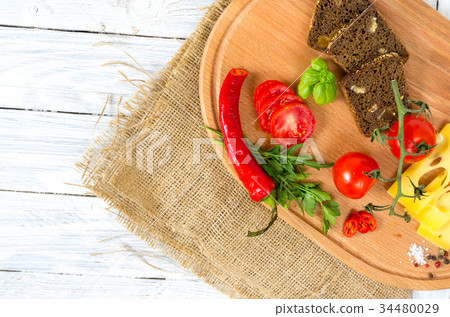 Fresh vegetables on a cutting board. Copyspace. Fresh vegetables on a cutting board. Copyspace. 34480029