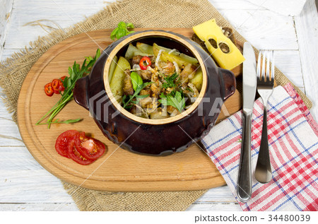 Potatoes in clay pots. Potato with bacon. Potatoes in clay pots. Potato with bacon. 34480039