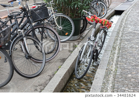 Small water canals in the streets in Freiburg 34481624