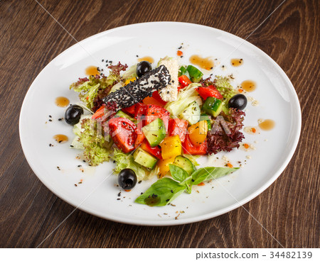 Traditional greek salad with fresh vegetables Traditional greek salad with fresh vegetables 34482139