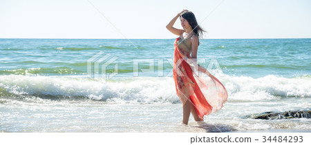 Young woman on the beach 34484293