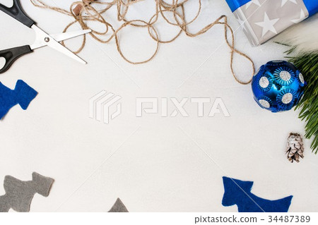 Festive background of Christmas present decoration Festive background of Christmas present decoration 34487389