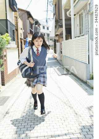 High school girl attending school 34487629