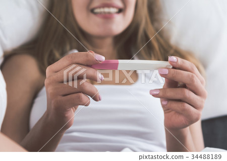 Happy young woman will be mother Happy young woman will be mother 34488189