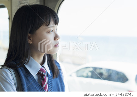 High school girl attending school train High school girl attending school train 34488743