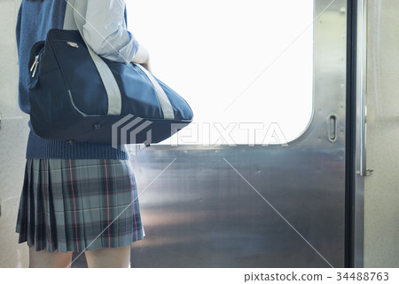 High school girl attending school train 34488763