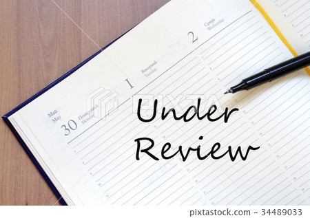 Under review concept Notepad 34489033