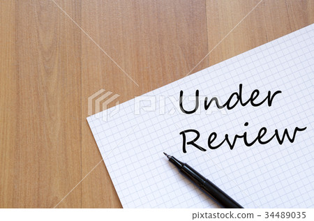 Under review concept Notepad 34489035