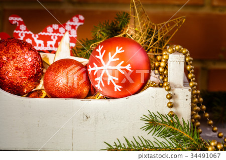 Christmas toys in a wooden box. Christmas toys in a wooden box. 34491067