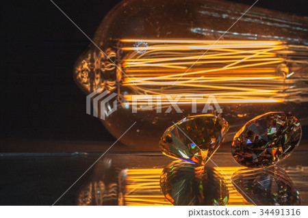 Sparkle of diamond from the lamp. 34491316