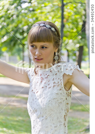 Beautiful bride in white lace dress of summer time 34491450