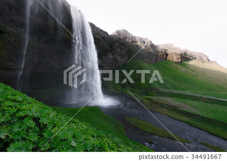 Sunrise on Seljalandfoss waterfall 34491667