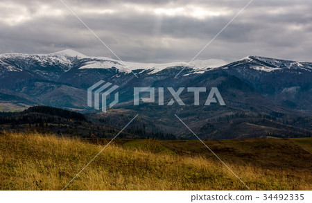 snowy mountain ridge in late autumn snowy mountain ridge in late autumn 34492335