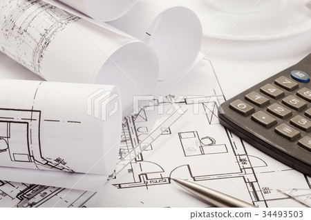 Calculator on architecture blueprints Calculator on architecture blueprints 34493503