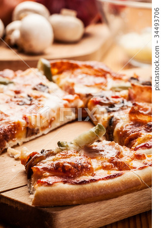 Pizza with cheese and ham Pizza with cheese and ham 34493706
