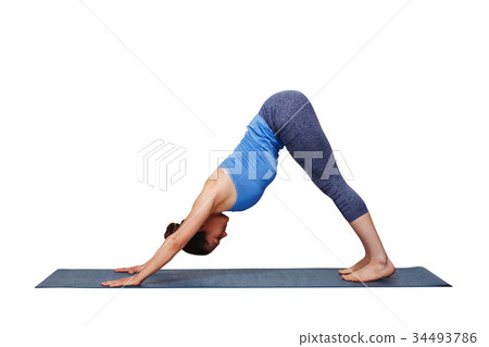 Woman doing Ashtanga Vinyasa yoga asana Adhomukha 34493786