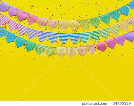 Colored flags garland. Yellow background. 34495539