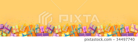 Colored gift boxes with colorful ribbons.  34497740