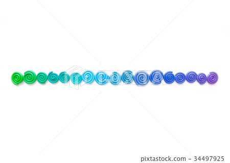 Background of plasticine. Twisted colored spirals Background of plasticine. Twisted colored spirals 34497925