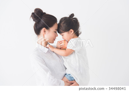 Parent and child with an apple Parent and child with an apple 34498041