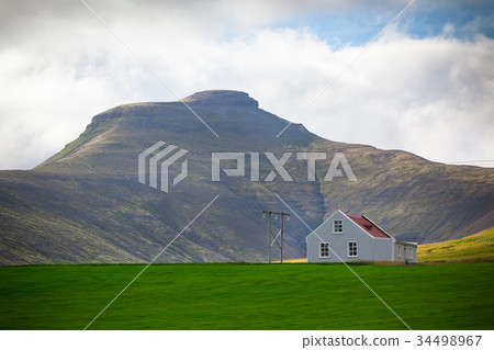 Mountains landscape with an Icelandic House Mountains landscape with an Icelandic House 34498967