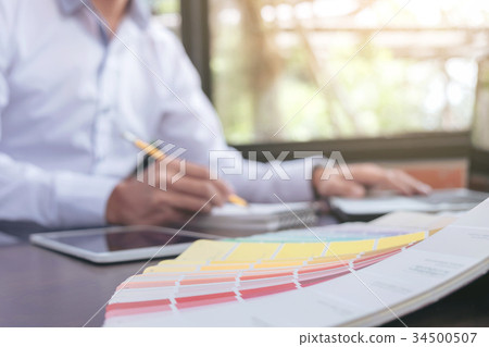 Creative creativity graphic designer working with graphics table 34500507