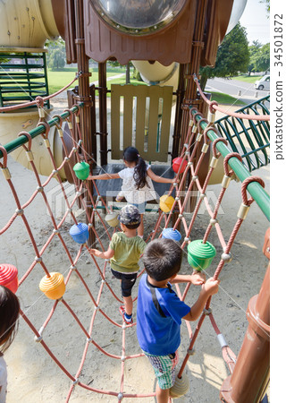 Children playing in the park 34501872