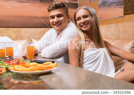 Nice young sexy couple shot at table in sauna 34501996