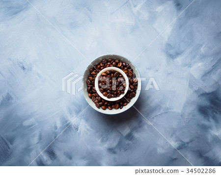 Whole Coffee beans in bowl 34502286