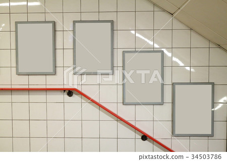 billboard in underground hall 34503786