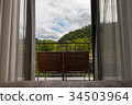 two chairs at the balcony 34503964
