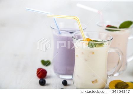 Smoothies or yogurt with fresh berries. Smoothies or yogurt with fresh berries. 34504347