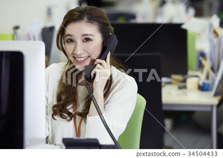 Woman working in the office Woman working in the office 34504433