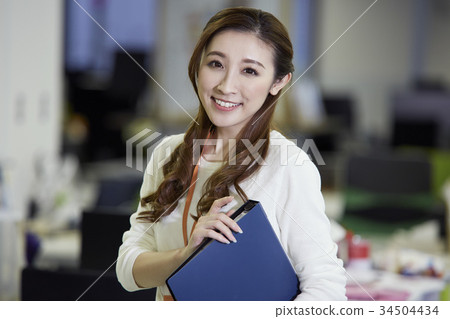 Woman working in the office Woman working in the office 34504434