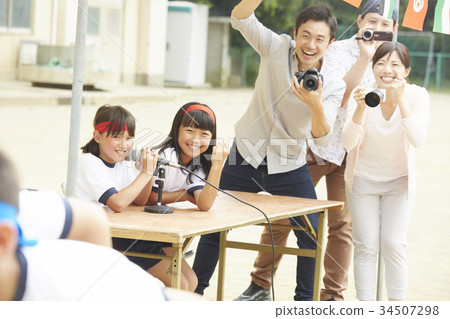 A guardian who shoots at an athletic meet A guardian who shoots at an athletic meet 34507298