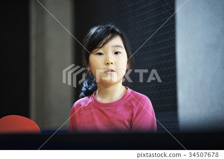 Girl playing table tennis 34507678