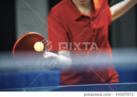 Table tennis player at hand 34507972